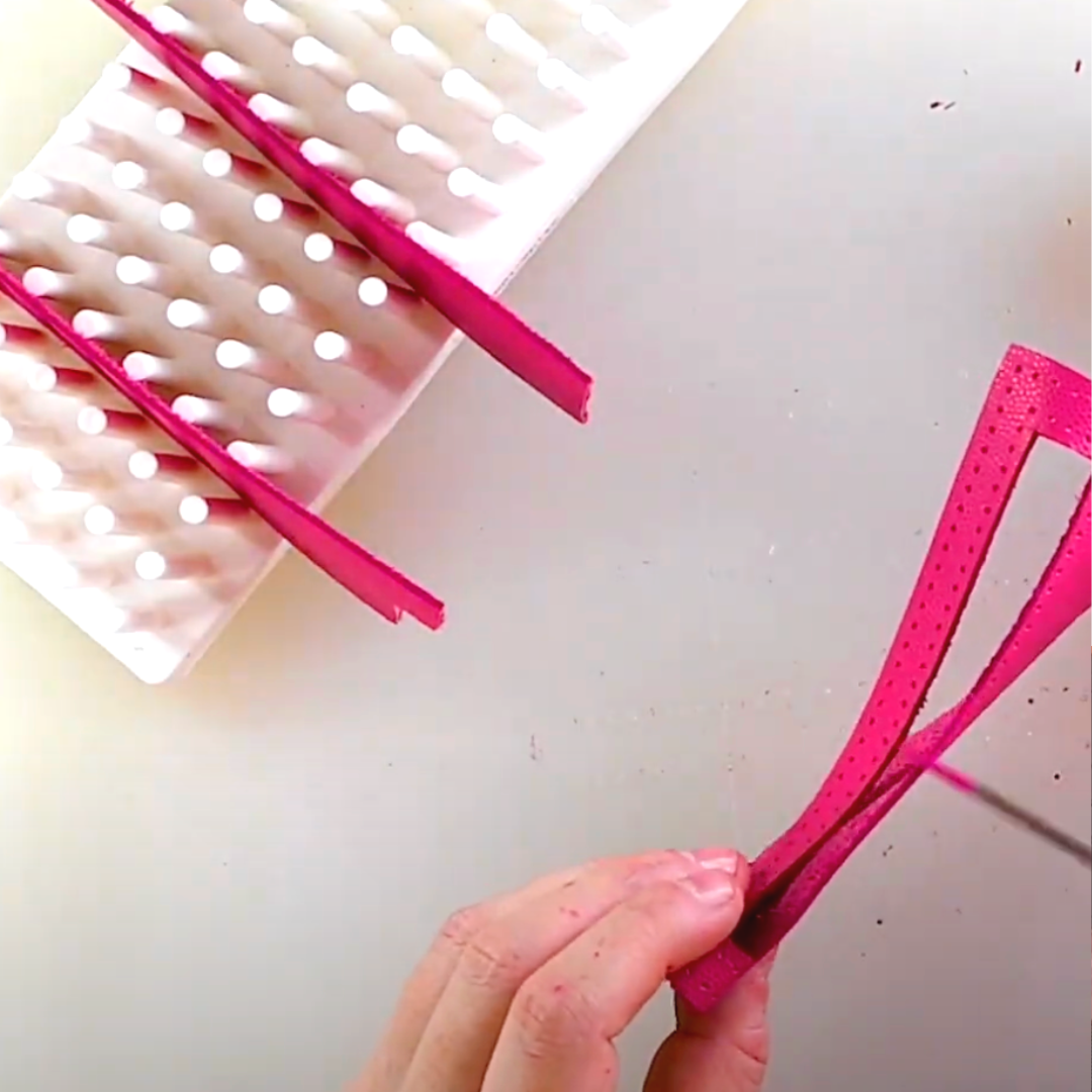 Plastic holder for drying leather parts