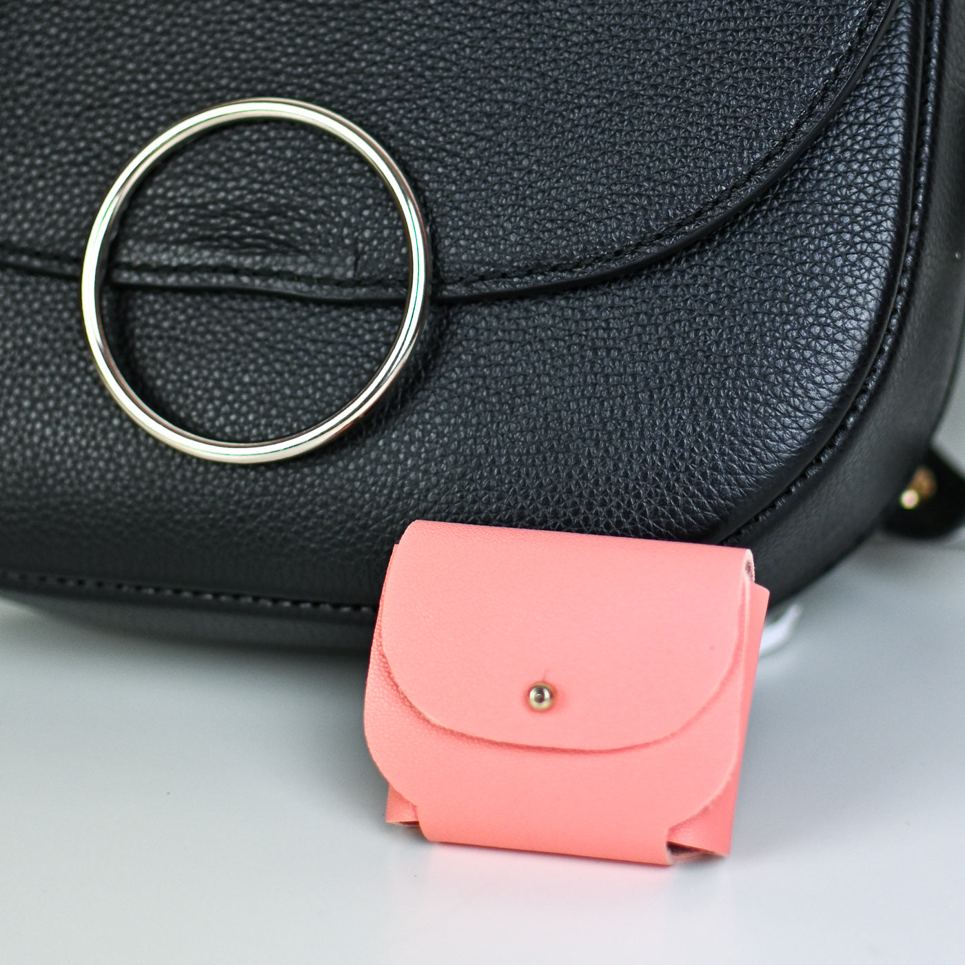 Mini saddle made from the same leather